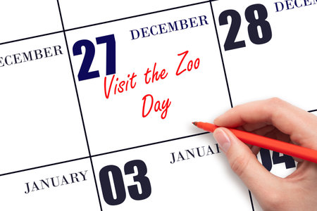 December 27. Hand writing text Visit the Zoo Day on calendar date. Save the date. Holiday. Day of the year concept.の写真素材
