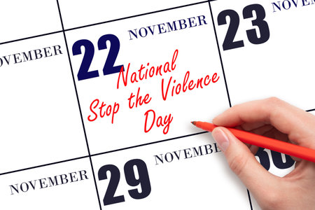 November 22. Hand writing text National Stop the Violence Day on calendar date. Save the date. Holiday. Important date. Day of the year concept.の写真素材