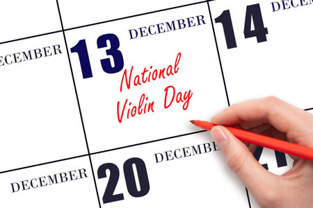 December 13. Hand writing text National Violin Day on calendar date. Save the date. Holiday. Day of the year concept.の写真素材