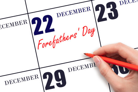 December 22. Hand writing text Forefathers Day on calendar date. Save the date. Holiday. Day of the year concept.の写真素材