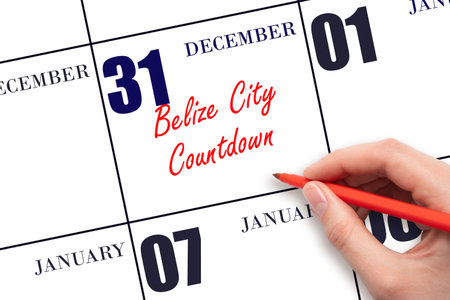 December 31. Hand writing text Belize City Countdown on calendar date. Save the date. Holiday. Day of the year concept.の写真素材