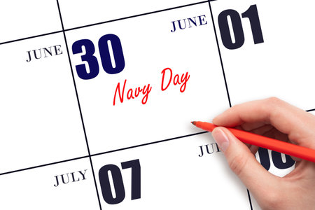 June 30. Hand writing text Navy Day on calendar date. Save the date. Holiday. Day of the year concept.の写真素材