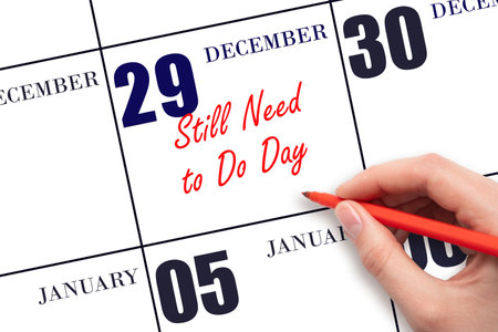 December 29. Hand writing text Still Need to Do Day on calendar date. Save the date. Holiday.  Day of the year concept.の写真素材
