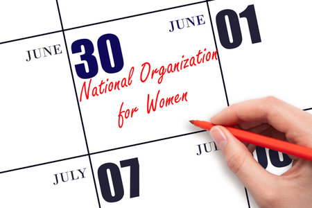 June 30. Hand writing text National Organization for Women on calendar date. Save the date. Holiday. Day of the year concept.の写真素材