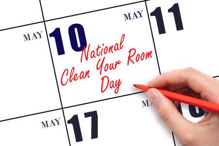 May 10. Hand writing text National Clean Your Room Day on calendar date. Save the date. Holiday.  Planning or scheduling concept.の写真素材