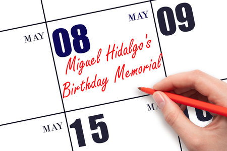 May 8. Hand writing text Miguel Hidalgo's Birthday Memorial on calendar date. Save the date. Holiday. Planning or scheduling concept.の写真素材