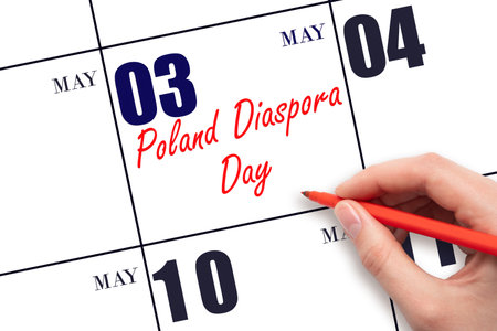 May 3. Hand writing text Poland Diaspora Day on calendar date. Save the date. Holiday.  Planning or scheduling concept.の写真素材