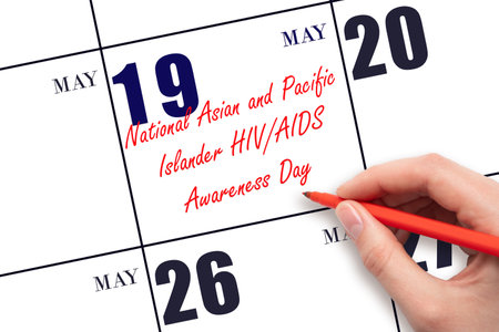 May 19. Hand writing text National Asian and Pacific Islander HIV AIDS Awareness Day on calendar date. Save the date. Holiday. Planning or scheduling concept.の写真素材