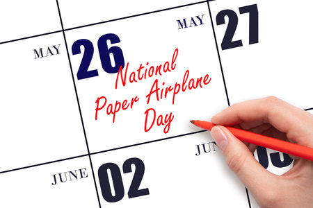 May 26. Hand writing text National Paper Airplane Day on calendar date. Save the date. Holiday. Planning or scheduling concept.の写真素材
