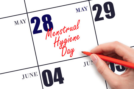May 28. Hand writing text Menstrual Hygiene Day on calendar date. Save the date. Holiday. Planning or scheduling concept.の写真素材