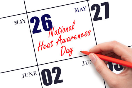 May 26. Hand writing text National Heat Awareness Day on calendar date. Save the date. Holiday. Planning or scheduling concept.の写真素材