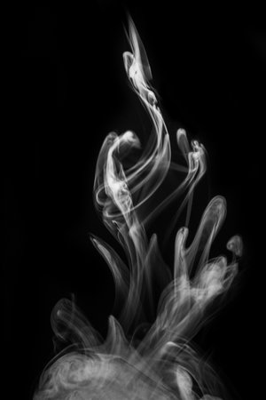steam, smoke, gas isolated on a black background. graphic resource for montage, overlay or texture, toned. Swirling, writhing smoke to overlay on your photos.の写真素材