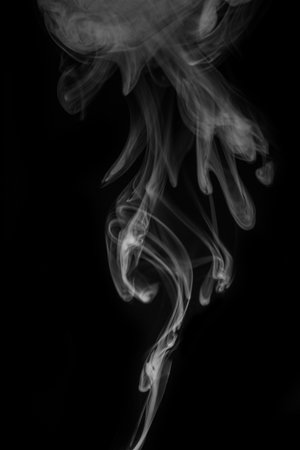 steam, smoke, gas isolated on a black background. graphic resource for montage, overlay or texture, toned. Swirling, writhing smoke to overlay on your photos. Smoky for Halloween.の写真素材