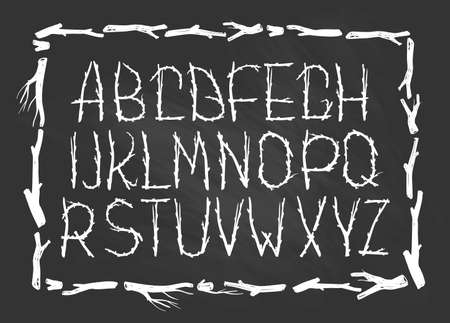 Chalk Alphabet made of branches of tree isolated on the chalkboard . Natural tribal font.のイラスト素材
