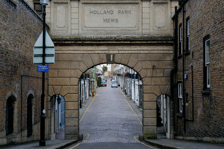 Entrance to Holland Park Mews. Houses in mews are one of the most luxurious and desirable in Londonのeditorial素材