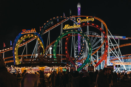 The Munich Looping Roller coaster ride at Winter Wonderland, annual Christmas Fair in London, UK. The Munich Looping is the worldâs largest transportable roller coaster.のeditorial素材