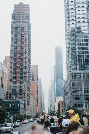 View of 42nd Street from the top of tourist bus. West 42nd Street is a major crosstown street in the Manhattan, known for its theatres and landmarks.のeditorial素材