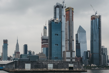 View of new high rise developments in Hudson Yards by Pier 76 in Manhattan, New York. Pier 76...