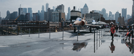 New York, USA - June 1, 2018: Planes and helicopters outside on the carrier in Intrepid Sea and Air Museum, an American military and maritime history museum in New York, USA.のeditorial素材