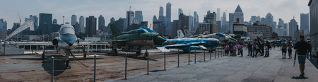 New York, USA - June 1, 2018: Planes and helicopters outside on the carrier in Intrepid Sea and Air Museum, an American military and maritime history museum in New York, USA.のeditorial素材