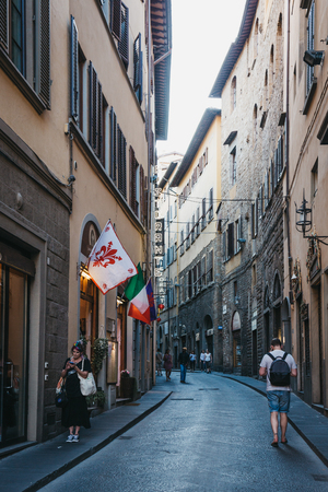Florence, Italy - July 4, 2017: People walking down the street of Florence, capital of Italyâs Tuscany region, is home to many masterpieces of Renaissance art and architecture.のeditorial素材