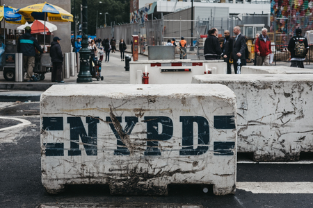 New York, USA - May 28, 2018: NYPD concrete barrier blocks deployed on the street in New York, USA....