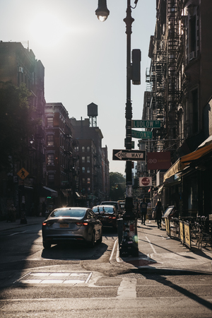 New York, USA - May 29, 2018: People walking on a street in Lower East Side, New York, USA, during...