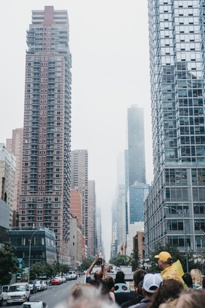 New York, USA - May 31, 2018: View of 42nd Street from the top of tourist bus. West 42nd Street is a major crosstown street in the Manhattan, known for its theatres and landmarks.のeditorial素材