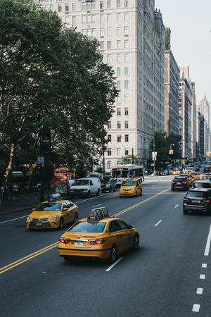 New York, USA - June 1, 2018: Numerous yellow taxis on the street in New York. Yellow taxis are...