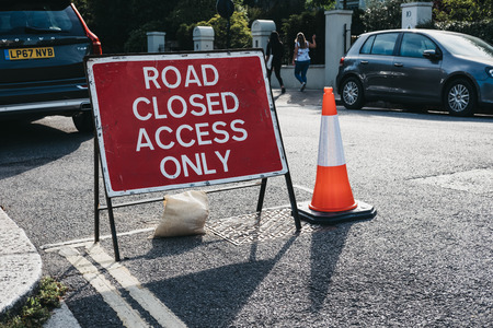 London, UK - August 1, 2018: Road closure sign a street in Hampstead, London, an affluent area favoured by academics, artists and media figures.のeditorial素材
