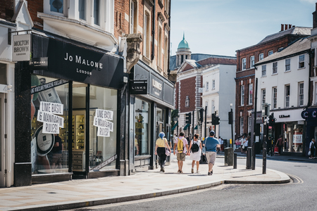 London, UK - August 1, 2018. People walking on a street in Richmond, a suburban town in south-west...