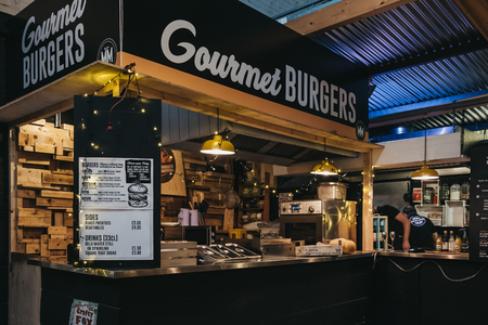 London, UK - November 2, 2018: Gourmet burger stand in Mercato Metropolitano, the first sustainable community market in London focused on revitalising the area and protecting environment.のeditorial素材