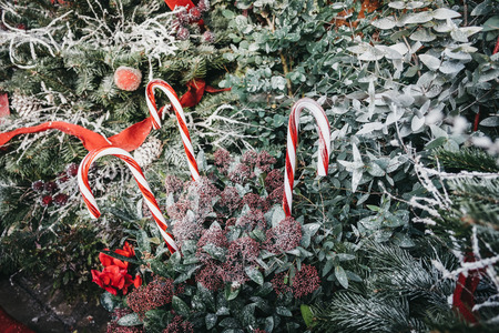 Close up of candy canes and Christmas decorations in Covent Garden Market, one of the most popular tourist sites in London, UK.のeditorial素材