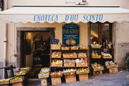 Riomaggiore, Italy - October 30, 2016: Groceries store in Riomaggiore, one of Cinque Terre villages, on a bright day. Cinque Terre was included as a UNESCO World Heritage Site in 1997.のeditorial素材