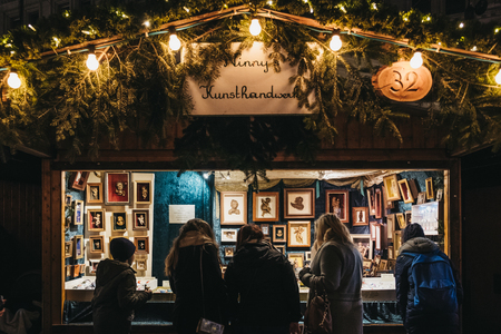 Vienna, Austria - November 24, 2018: People browsing Christmas decor at Christmas World on Rathausplatz, traditional Christmas Market in Vienna with over 150 booths offering food, drinks and crafts.のeditorial素材
