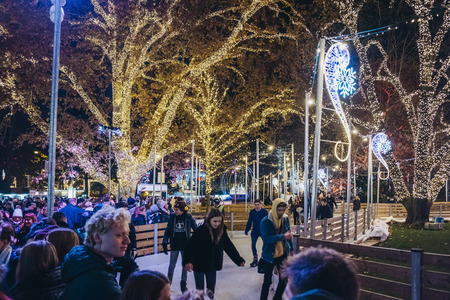Vienna, Austria - November 25, 2018: People ice-skating at Christmas World on Rathausplatz, traditional Christmas Market in Vienna with over 150 booths offering food and crafts.のeditorial素材