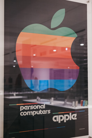 Prague, Czech Republic - August 28, 2018: Retro framed Apple computer poster on exhibit inside Apple...