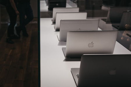 Prague, Czech Republic - August 28, 2018: Range of MacBooks on display inside Apple Museum in...