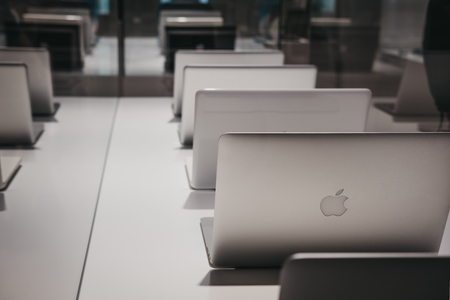 Prague, Czech Republic - August 28, 2018: Range of MacBooks on display inside Apple Museum in Prague, the largest private collection of Apple products around the world.のeditorial素材