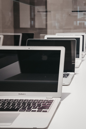 Prague, Czech Republic - August 28, 2018: Range of MacBooks on display inside Apple Museum in Prague, the largest private collection of Apple products around the world.のeditorial素材