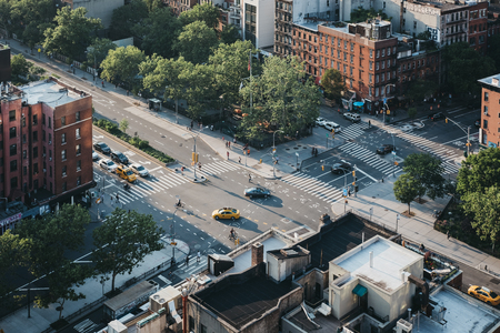 New York, USA - May 29, 2018: Aerial view of people and cars on a street in Lower East Side, New York, USA.  New York is one of the most visited cities in the world.のeditorial素材