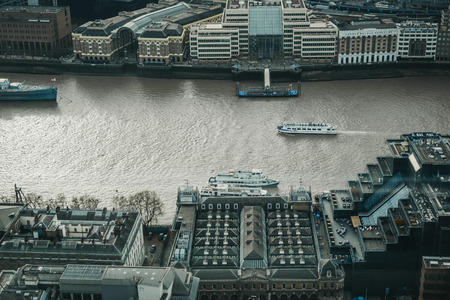 London, UK - January 13, 2019: City cruise boats on the Thames, view from above. River cruises are very popular with tourists all year around.のeditorial素材