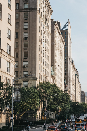 New York, USA - May 31, 2018: Facades of buildings on Central Park West, NYC. The street is a part...