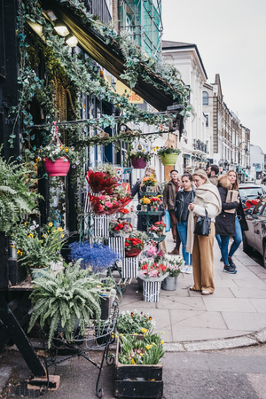 London, UK - February 16, 2019: People by the The Fitzroy's Flowers Collection florist in Primrose Hill, an upscale area of North London that got its name from the famous Primrose Hill.のeditorial素材