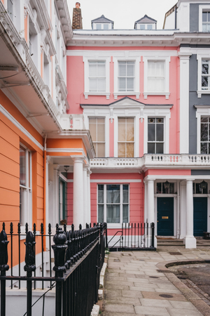 Pastel coloured terraced Victorian houses in London, UK.の写真素材