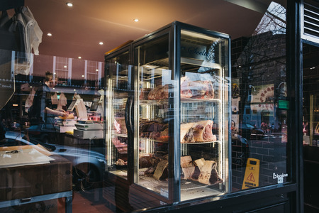 London, UK - February 16, 2019: Meat on retail display of Primrose Hill Butchery in Primrose Hill,...