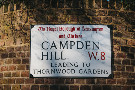 London, UK - February 23, 2019: Campden Hill street name sign on a white wall in The Royal Borough of Kensington and Chelsea, an affluent area in West London. Leading to Thornwood Gardens.のeditorial素材