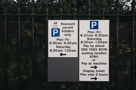 London, UK - February 23, 2019: Parking restrictions sign on a street in Holland Park, The Royal Borough of Kensington and Chelsea. Holland Park is an affluent area in West London.のeditorial素材