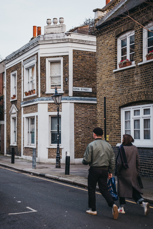London, UK - February 03, 2019: People walking on Ezra street in Tower Hamlets, London, UK, motion blur. Tower Hamlets is the second-most densely populated English district.のeditorial素材