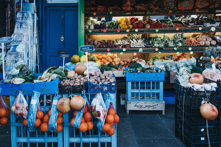 London, UK - February 03, 2019: Fresh fruits and vegetables on sale at a convenience store in London, UK. These stores are located throughout the city and are a great way to buy fresh produce.のeditorial素材